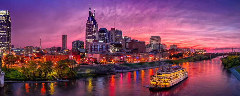 The Nashville skyline at sunset, above the Cumberland River